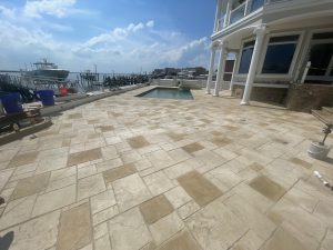 Stamped concrete pool deck and concrete patio in Brigantine, NJ installed by Metric Concrete