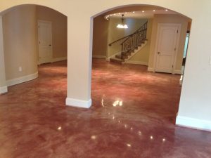 Residential polished concrete basement floor installed by Metric Concrete